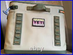 YETI Used Hopper Flip 18 Soft Cooler Field Tan/Orange with rainbow trout patch